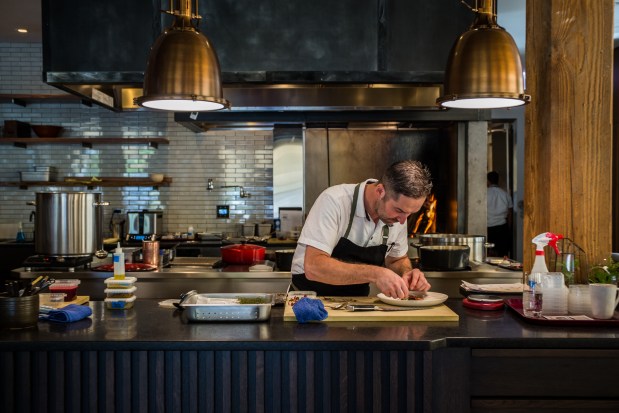 Smyth's chef and owner John Shields prepares aged strip loin dish at the restaurant on 177 N Ada Street in Chicago on Oct. 13, 2016. (Zbigniew Bzdak/Chicago Tribune).