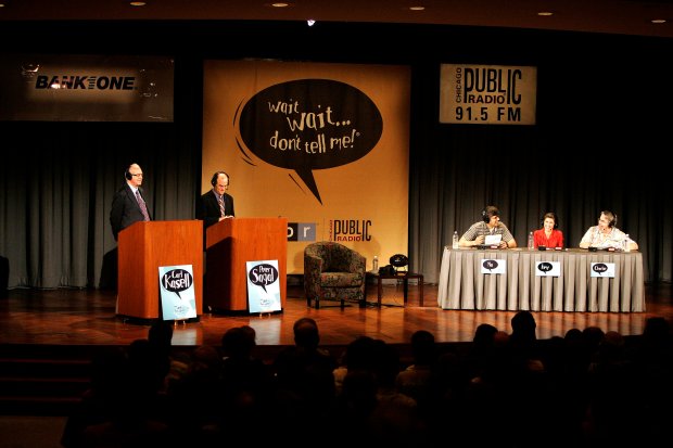 Guest panelists, seated from left, Mo Rocca, Amy Dickinson and Charlie Pierce tape the radio show "Wait, Wait ... Don't Tell Me" with host Peter Sagal and co-host Carl Kassell at the Bank One Auditorium in Chicago in 2005. (Charles Cherney/Chicago Tribune)