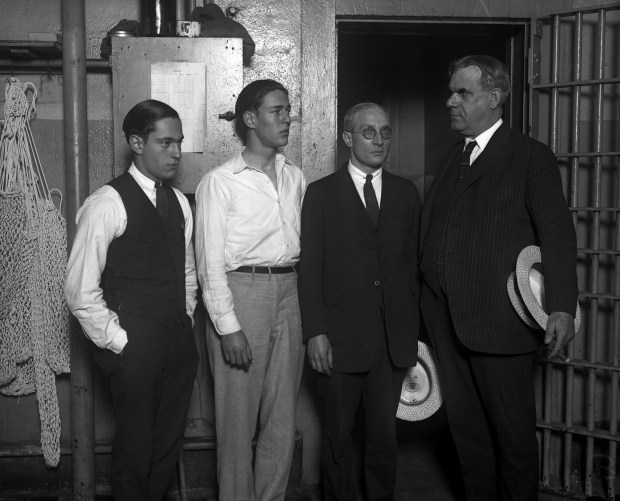 Nathan Leopold Jr., from left, Richard Loeb, Atty. Benjamin Bachrach and Dr. James Hall in 1924. (Chicago Tribune historical photo)