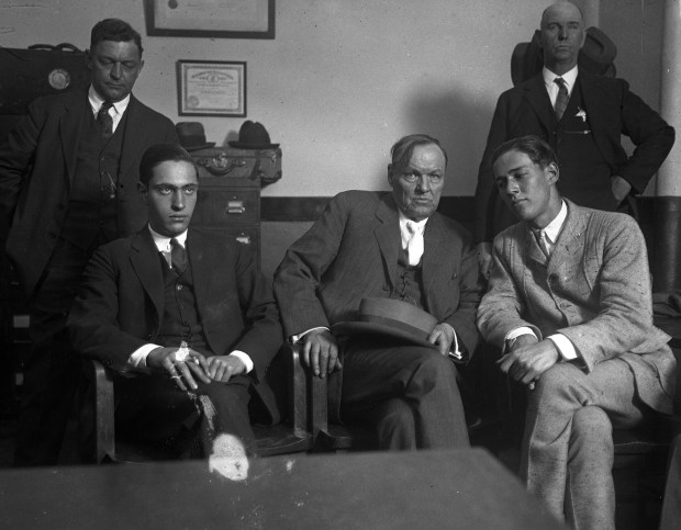 Nathan Leopold Jr., seated from left, attorney Clarence Darrow and Richard Loeb in 1924. (Chicago Herald and Examiner)