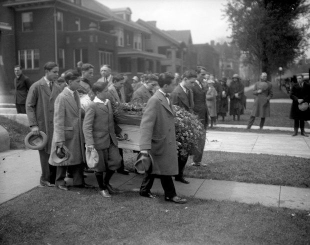 Eight of Robert "Bobby" Franks friends from school act as pallbearers at the 14 year-old's funeral on May 25, 1924. The funeral service was held at the Franks home at 5052 Ellis Avenue and the casket, guarded by six motorcycle police, was taken to Rosehill Cemetery in Chicago. At the time of the funeral, the killers were still at large. (Chicago Tribune historical photo)