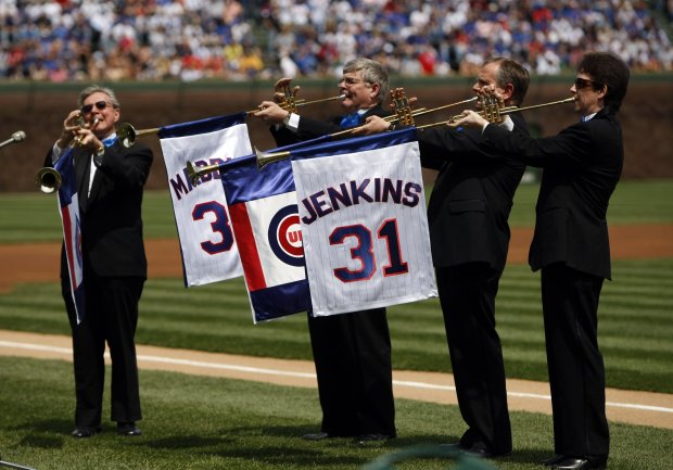 Trumpeters play as Cubs greats Ferguson Jenkins and Greg Maddux are introduced during a ceremony retiring their number 31 before Cubs' game against Florida Marlins in Chicago, IL on Sunday, May 3, 2009. (Scott Strazzante/Chicago Tribune) ..OUTSIDE TRIBUNE CO.- NO MAGS, NO SALES, NO INTERNET, NO TV, CHICAGO OUT.. (baseball pro)