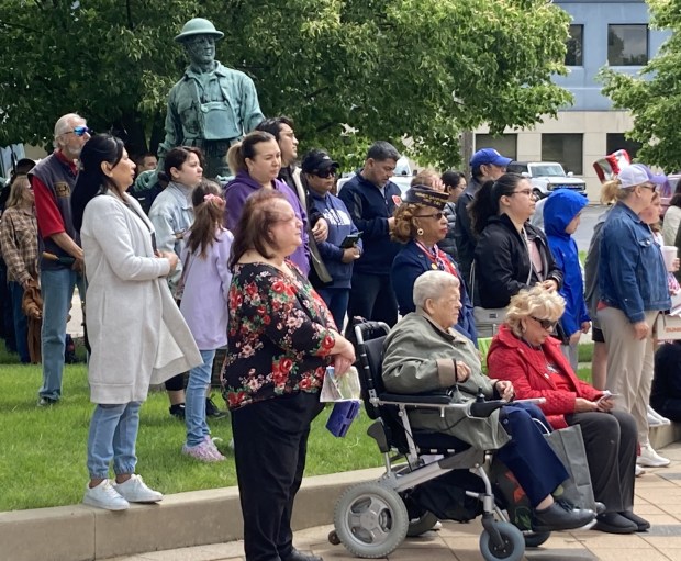 Part of a crowd of approximately 150 people listens to speakers at Waukegan's Memorial Day ceremony. (Steve Sadin/Lake County News-Sun)