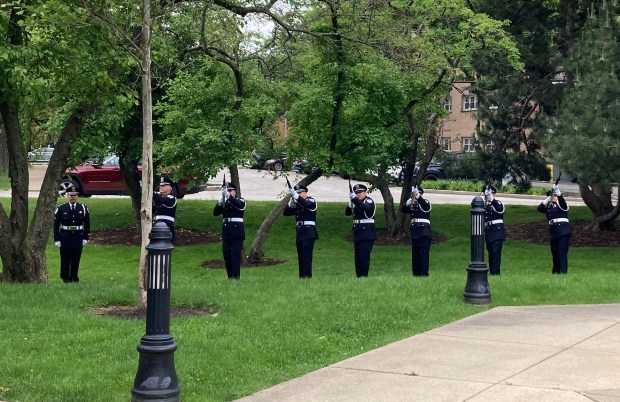 The Skokie police honor guard performed a Memorial Day ceremony rifle salute Monday.