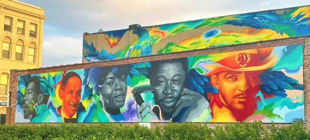 A new mural by artist Max Sansing in downtown Aurora honors blues music legends B.B. King, Koko Taylor, Buddy Guy, Tampa Red and Stevie Ray Vaughan. (City of Aurora)