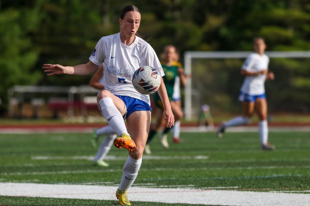 St. Charles North's Rian Spaulding (5) gains possession of the ball during the Class 3A state semifinal against Fremd in Naperville on Friday, May 31, 2024. (Troy Stolt/for the Aurora Beacon News)