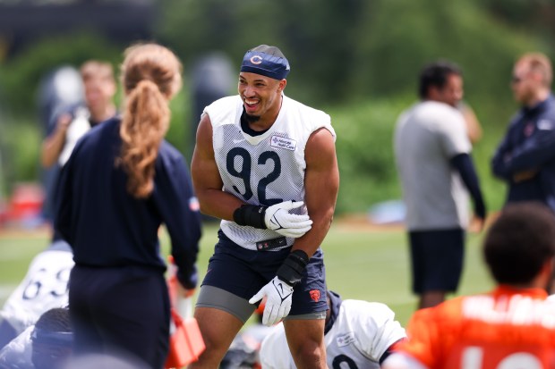 Chicago Bears defensive end Daniel Hardy (92) laughs as he stretches during minicamp at Halas Hall in Lake Forest on June 5, 2024. (Eileen T. Meslar/Chicago Tribune)