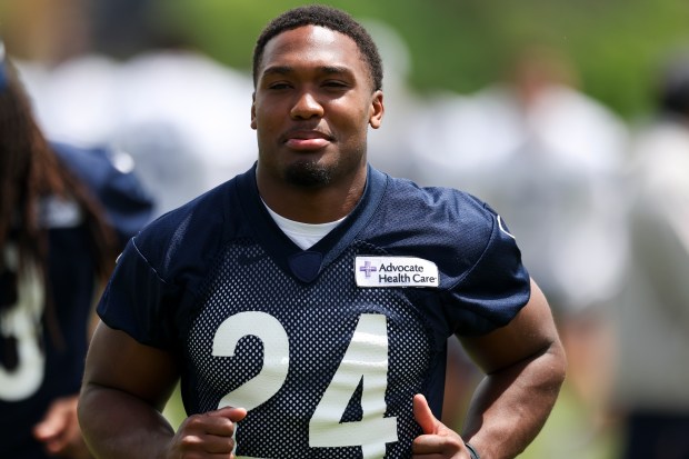 Chicago Bears running back Khalil Herbert (24) warms up during minicamp at Halas Hall in Lake Forest on June 5, 2024. (Eileen T. Meslar/Chicago Tribune)