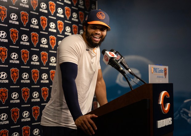 Chicago Bears quarterback Caleb Williams (18) speaks with the media following minicamp at Halas Hall on June 6, 2024, in Lake Forest (Stacey Wescott/Chicago Tribune)