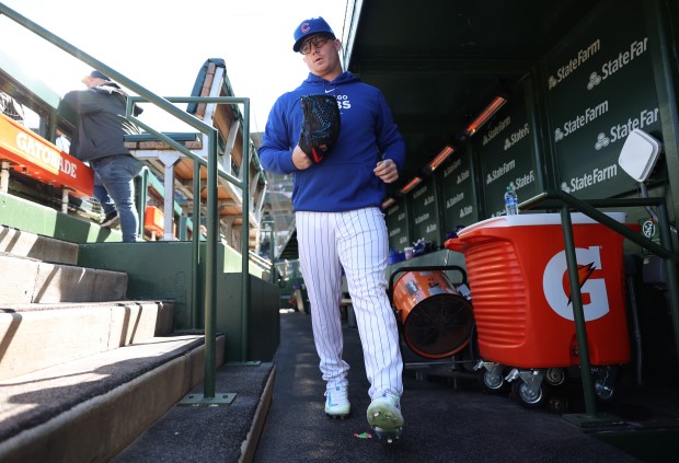 Cubs pitcher Jordan Wicks exits the dugout for the bullpen to warm up before a game against the Dodgers at Wrigley Field on April 6, 2024. (John J. Kim/Chicago Tribune)