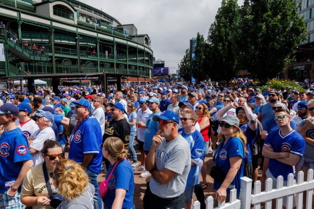 Fans attend a statue dedication ceremony for former Cubs player Ryne Sandberg outside Wrigley Field Sunday June 23, 2024 in Chicago. (Armando L. Sanchez/Chicago Tribune)