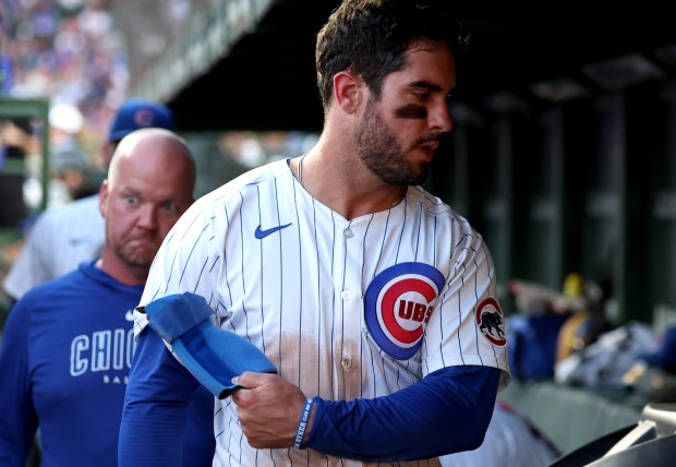 Chicago Cubs designated hitter Mike Tauchman (40) leaves the game with left groun tightness in the bottom of the third inning against the San Francisco Giants at Wrigley Field on June 16, 2024, in Chicago. (Stacey Wescott/Chicago Tribune)