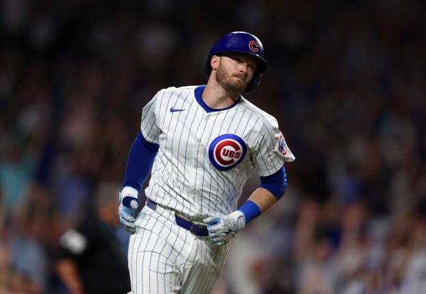Chicago Cubs outfielder Ian Happ (8) hits a three-run homer in the bottom of the seventh inning during a game against the San Francisco Giants at Wrigley Field on June 17, 2024, in Chicago. Happ's homer put the Cubs ahead 6-3 but the lead did not hold. The Giants beat the Cubs 7-6. (Stacey Wescott/Chicago Tribune)