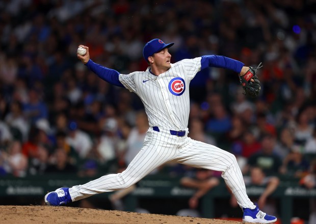 Chicago Cubs pitcher Hayden Wesneski (19) comes in for Chicago Cubs pitcher Luke Little (43) in the top of the sixth inning against the San Francisco Giants at Wrigley Field on June 17, 2024, in Chicago. (Stacey Wescott/Chicago Tribune)