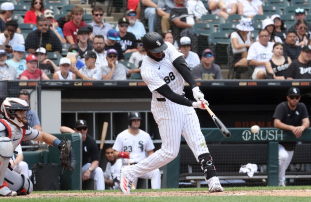 White Sox centerfielder Luis Robert Jr. connects for an RBI double against the Astros in the fifth inning at Guaranteed Rate Field on June 20, 2024, in Chicago. (John J. Kim/Chicago Tribune)