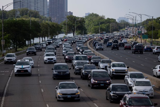 Vehicles drive on North DuSable Lake Shore Drive near Chicago's North Avenue Beach during the afternoon rush hour on June 7, 2024. (Vincent Alban/Chicago Tribune)