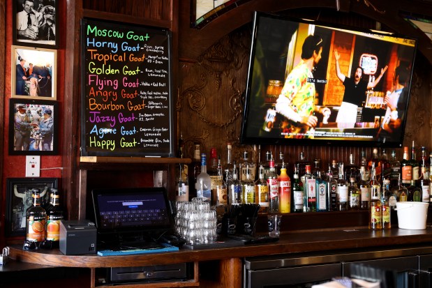 A list of goat-themed cocktails hangs on the wall of the newly opened Billy Goat Tavern in Wrigleyville on June 6, 2024. (Eileen T. Meslar/Chicago Tribune)