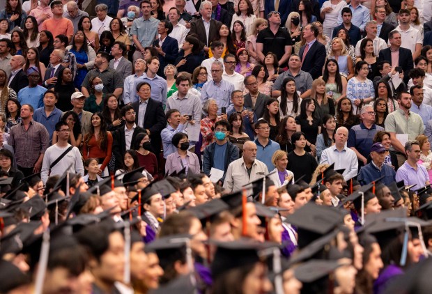 Family and friends watch during Northwestern University's commencement on June 9, 2024, at the United Center. (Brian Cassella/Chicago Tribune)