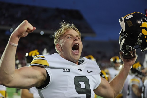 Iowa punter Tory Taylor celebrates after the Hawkeyes defeated Wisconsin at Camp Randall Stadium on Oct. 14, 2023, in Madison, Wis. (Stacy Revere/Getty)