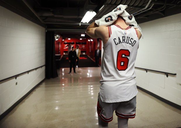 Chicago Bulls guard Alex Caruso (6) heads to the locker room after a loss to the Boston Celtics at the United Center in Chicago on March 23, 2024. (Chris Sweda/Chicago Tribune)