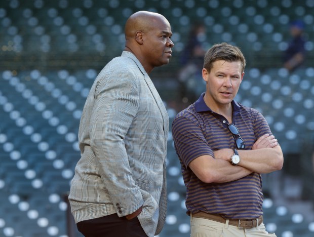 Former White Sox player Frank Thomas, left, and general manager Chris Getz talk before a game against the Cubs on June 5, 2024, at Wrigley Field. (John J. Kim/Chicago Tribune)