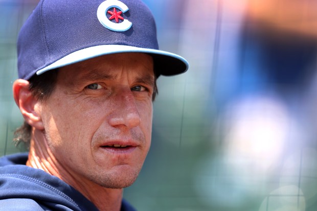 Chicago Cubs manager Craig Counsell looks out from the dugout before the start of a game against the New York Mets at Wrigley Field in Chicago on June 21, 2024. (Chris Sweda/Chicago Tribune)