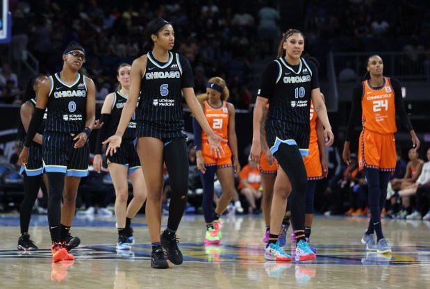 Chicago Sky players Diamond DeShields (0), Angel Reese (5), and Kamilla Cardoso (10) walk downcourt late in the game against the Connecticut Sun on June 12, 2024, at Wintrust Arena. (Chris Sweda/Chicago Tribune)