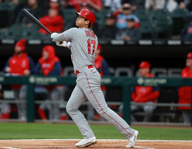 Los Angeles Angels batter Shohei Ohtani (17) hits a solo home run in the first inning of a game against the Chicago White Sox at Guaranteed Rate Field in Chicago on Friday, April 29, 2022. (Chris Sweda/Chicago Tribune)
