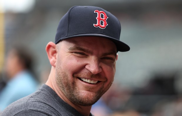 Boston Red Sox relief pitcher Liam Hendriks has a laugh on the field before a game against the Chicago White Sox at Guaranteed Rate Field n Chicago on June 6, 2024. (Chris Sweda/Chicago Tribune)