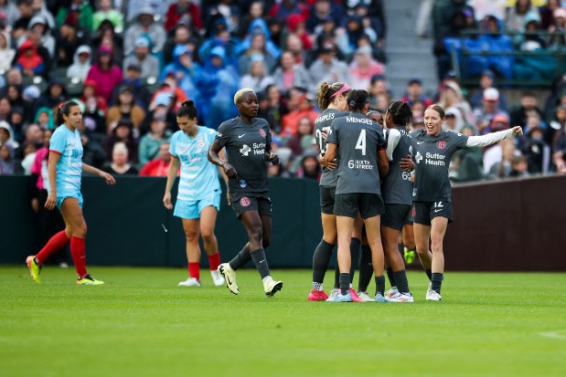 Bay FC players celebrate after scoring during the game against the Chicago Red Stars at Wrigley Field on June 8, 2024. (Eileen T. Meslar/Chicago Tribune)