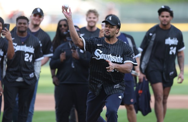 Bears rookie wide receiver Rome Odunze throws out a ceremonial first pitch before a White Sox game at Guaranteed Rate Field on May 23, 2024. (Chris Sweda/Chicago Tribune)