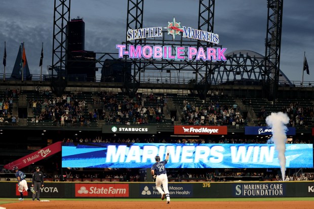 Mariners' Cal Raleigh celebrates his walk-off grand slam to beat the White Sox at T-Mobile Park on June 10, 2024 in Seattle. (Photo by Steph Chambers/Getty Images)