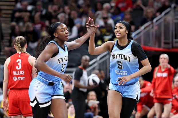 Chicago Sky's Angel Reese celebrates a basket with Michaela Onyenwere against the Indiana Fever during the third quarter at Gainbridge Fieldhouse on June 1, 2024(Andy Lyons/Getty Images)