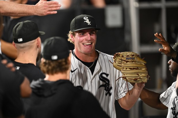 White Sox starter Jonathan Cannon is congratulated in the dugout after pitching 8 2/3 shutout innings against the Astros on June 18, 2024, at Guaranteed Rate Field. (Jamie Sabau/Getty)