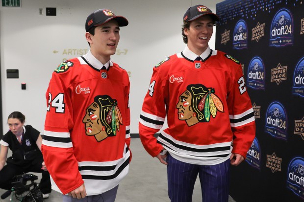 (L-R) John Mustard and Anthony "AJ" Spellacy, draft picks for the Chicago Blackhawks are seen during the 2024 Upper Deck NHL Draft at Sphere on June 29, 2024 in Las Vegas, Nevada. (Photo by Ethan Miller/Getty Images)