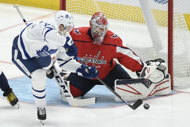 Maple Leafs right wing Ilya Mikheyev tries to get the puck past Capitals goaltender Ilya Samsonov on Oct. 16, 2019, in Washington. (Nick Wass/AP)