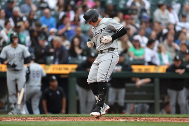 White Sox first baseman Andrew Vaughn celebrates his solo home run in the third inning against the Mariners on June 13, 2024, at T-Mobile Park in Seattle. (Steph Chambers/Getty)