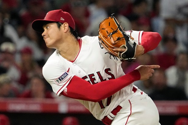 Los Angeles Angels starting pitcher Shohei Ohtani throws to the plate during the seventh inning of a baseball game against the Chicago White Sox Tuesday, June 27, 2023, in Anaheim, Calif. (AP Photo/Mark J. Terrill)