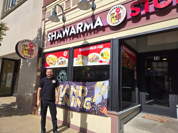 Mohanned Alali opened his new restaurant, Shawarma Stop, at 13 Douglas Ave. in downtown Elgin last week. He said the Mediterranean fast food he serves has received a positive response from customers. (Gloria Casas/The Courier-News)