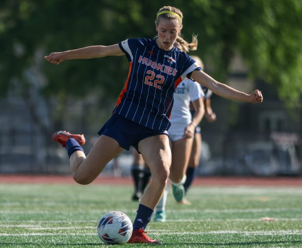 Naperville North's Claire DeCook (22) shoots the ball during the Class 3A East Aurora Regional championship game against Waubonsie Valley in Aurora on Friday May 17, 2024. (Troy Stolt/for the Naperville Sun)