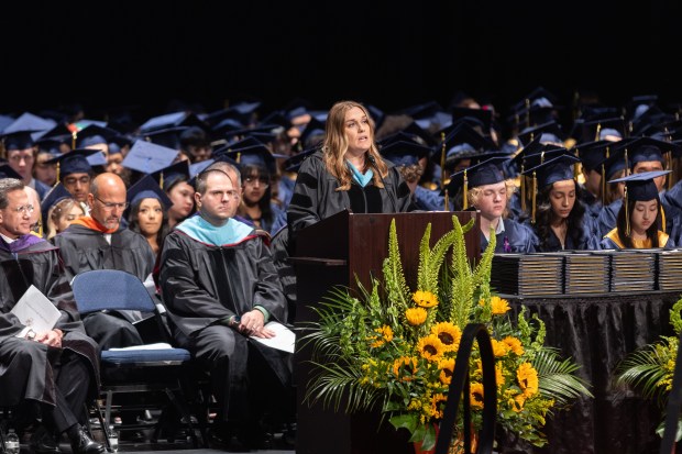 Glenbrook South Principal Barbara Georges speaks during the school's graduation ceremony at Rosemont Theatre on Sunday, June 2, 2024. (Troy Stolt/for the Pioneer Press)