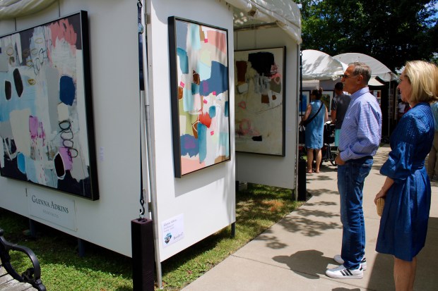 Booth 67 featured the work of Kentucky abstract painter Glenna Adkins, whose work was voted best in show during Art in the Village in Winnetka this past weekend. (Gina Grillo/Pioneer Press)