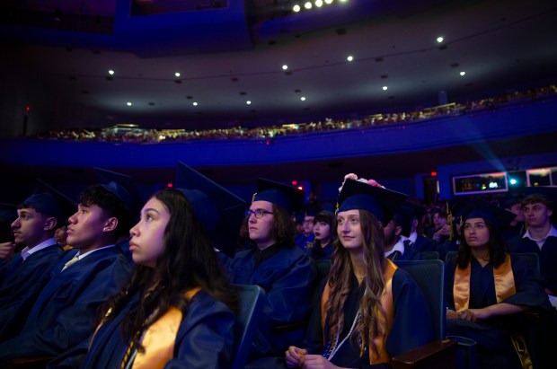 Students listen to the East Lyden High School graduation ceremony at the Rosemont Theatre on Tuesday, May 21, 2024 in Rosemont, Illinois. ( John Konstantaras-Pioneer-Press ) - PPN-L-fhj-leyden-east-graduation 00077682A