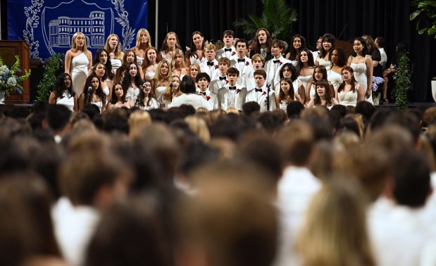 The Senior Commencement Choir performs at the 124th annual New Trier Township High School commencement on June 2, 2024 at NOW Arena in Hoffman Estates. (Karie Angell Luc/Pioneer Press)