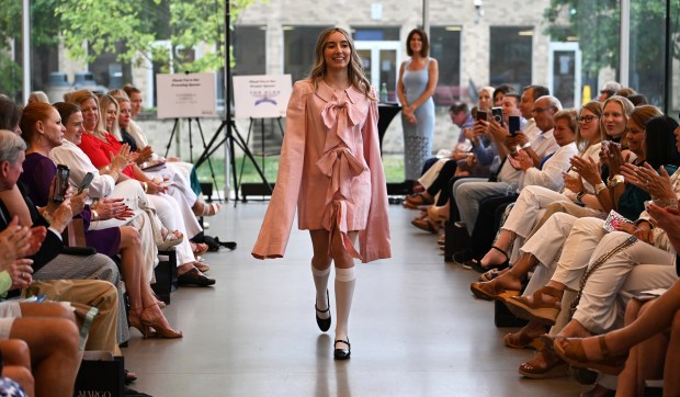 Mary Grace Nudo of Des Plaines, owner of Margo Boutique of Glenview, models at the 2024 Fashion Show hosted by Friends of Youth Services on June 20, 2024 at the McGrath Family Performing Arts Center at Loyola Academy (1100 Laramie Ave.) in Wilmette. (Karie Angell Luc/Pioneer Press)