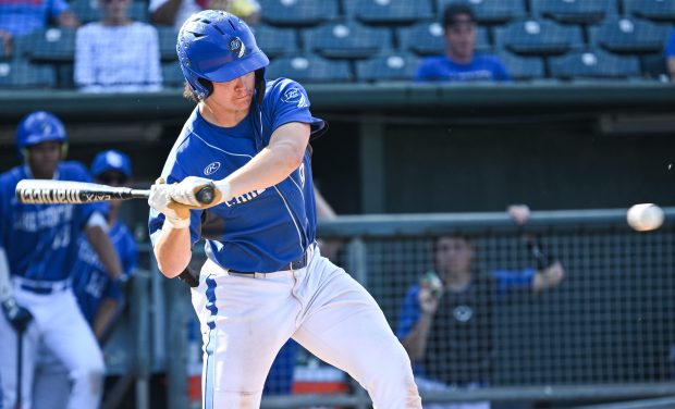 Lake Central's Drew Kosteba swings at a Chesterton pitch in the Class 4A regional on Monday, June 3, 2024. (Kyle Telechan/for the Post-Tribune)