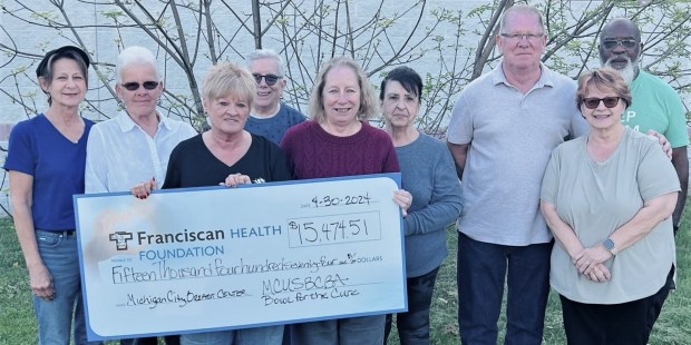 The Michigan City United States Bowling Congress Bowling Association recently raised $15,474 for Franciscan Health Breast Care Center Michigan City breast cancer patients. Pictured are, from left, City Lanes owner Jayne Johnston and Bowling Congress members Cheryl Adney, Cheryl Hale, Andi Wolfinsohn, Leslyn Quartuccio, Bonnie Jones, Dennis Hale, Libby Green, and Stafford Wilson. (Franciscan Health)