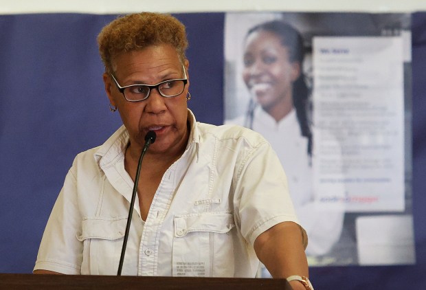 Resident Jackie Lee addresses Eric Parish, Executive Vice President of MGT during a meeting in Gary of the Indiana State Distressed Unit Appeal Board to consider terminating the district's distressed status after 7 years of state control on Monday, June 17, 2024. (John Smierciak/Post Tribune)