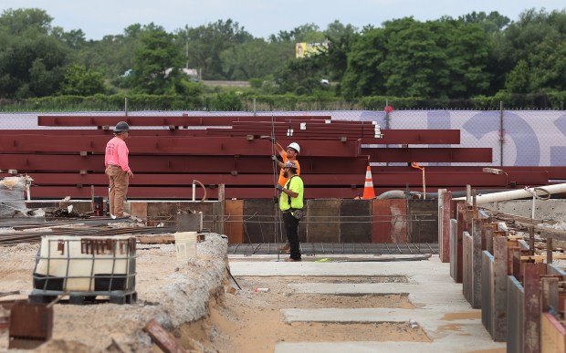 Workers install foundation forms for new footings during a groundbreaking ceremony at the Gary/Chicago International Airport for its new $12 million dollar aircraft hanger on Tuesday, June 18, 2024. (John Smierciak/Post Tribune)