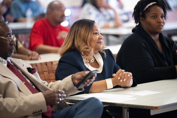 Newly-picked Gary Community School Corporation superintendent Yvonne Stokes sits as council members applaud her appointment during a public meeting on Friday, June 7, 2024. (Kyle Telechan/for the Post-Tribune)